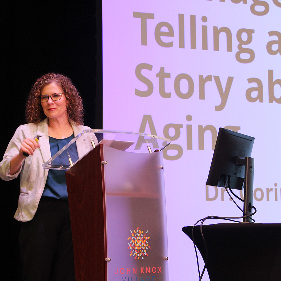 Dr. Corinne Auman speaking at John Knox Village