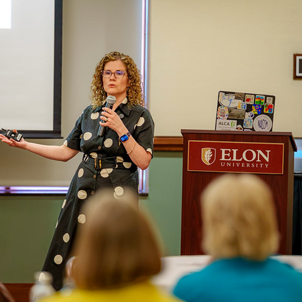 Dr. Corinne Auman speaking at Elon University